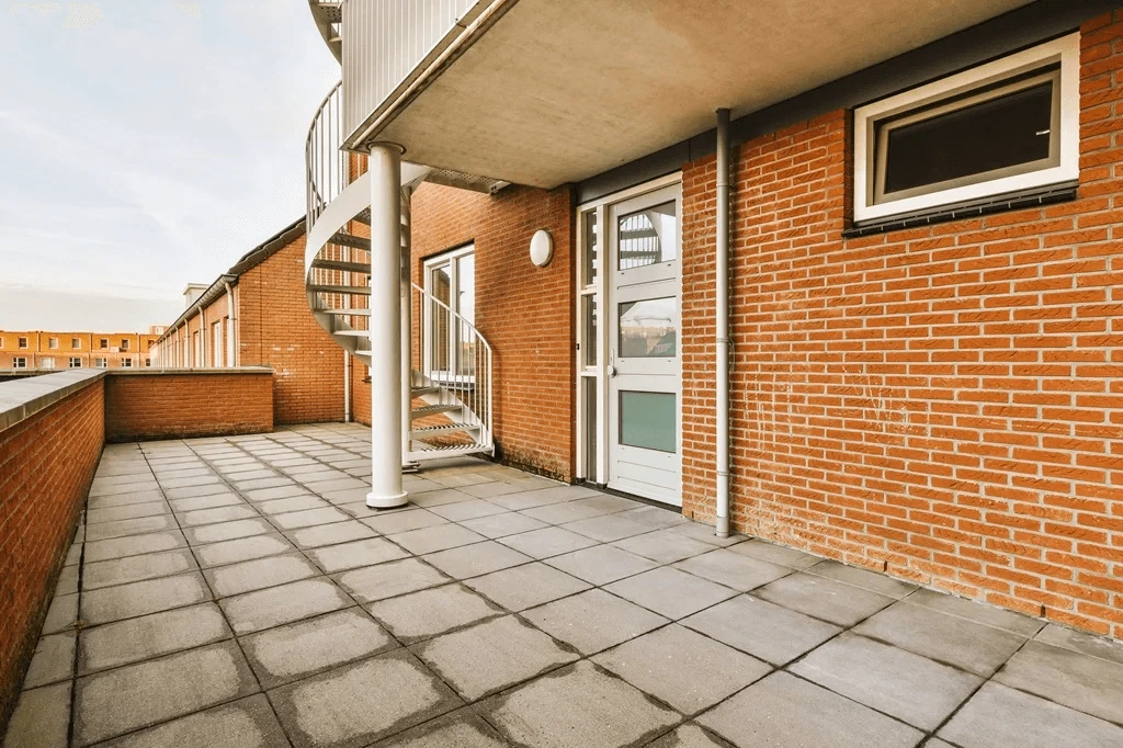 residential property featuring steel door with glass panel