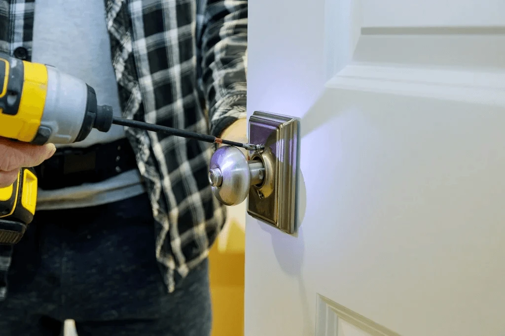 handyman knowledgeable at the different types of door knobs