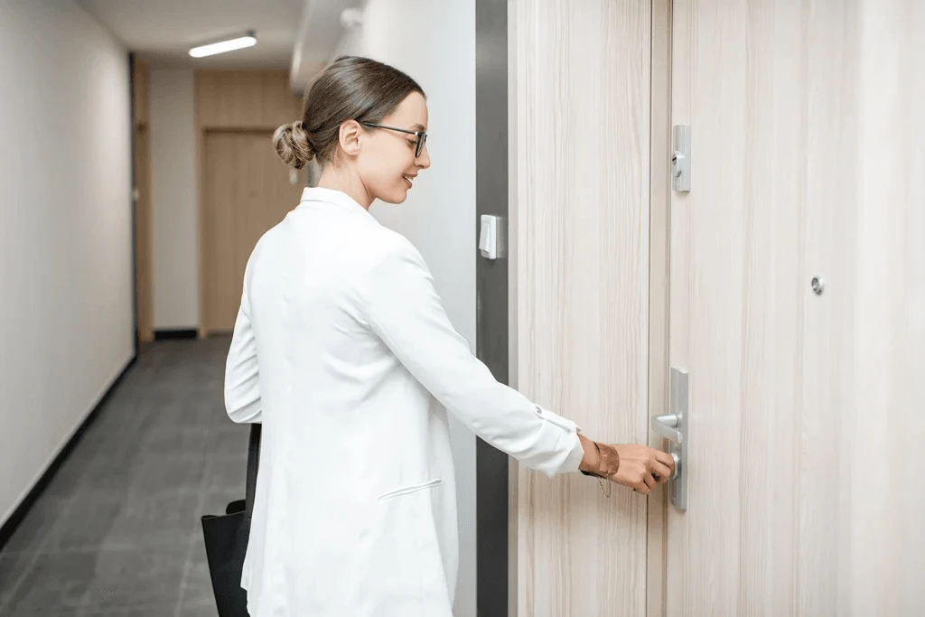 homeowner confident with the security of her flush door